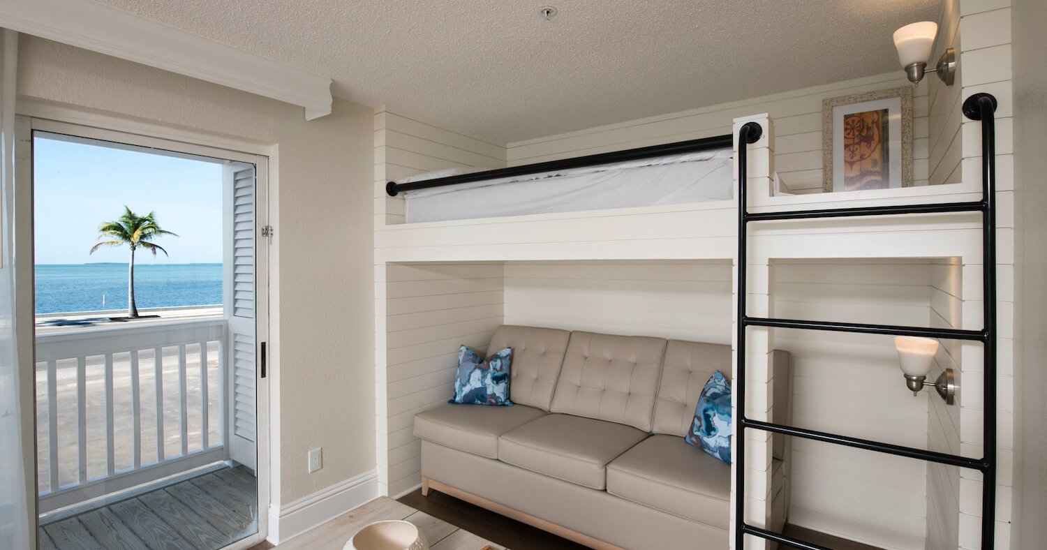 Interior view of a room at Havana Cabana equipped with a bunk bed.