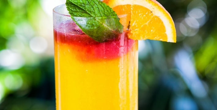 Mojitos with rum and pineapple on balcony